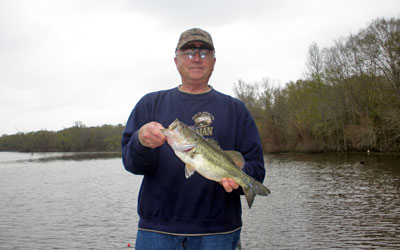 Jim with one of his Caney Bay bass caught on a small spinner